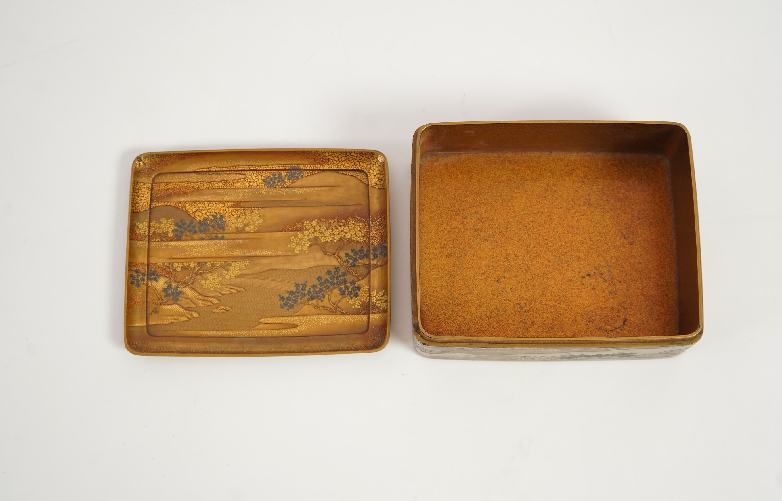 A Japanese gold lacquer ‘landscape’ box, tray and cover, 19th century